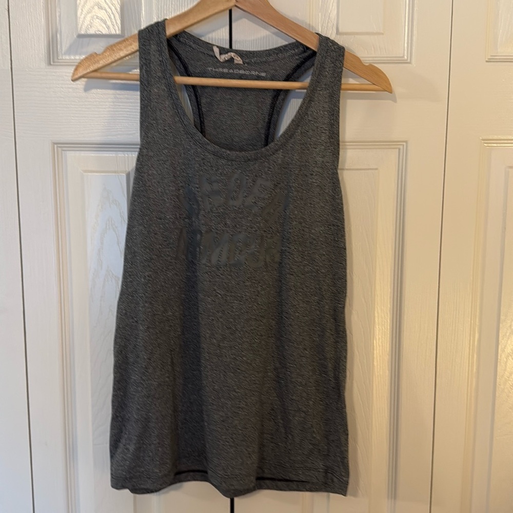 Under Armour soft tech material workout tank.